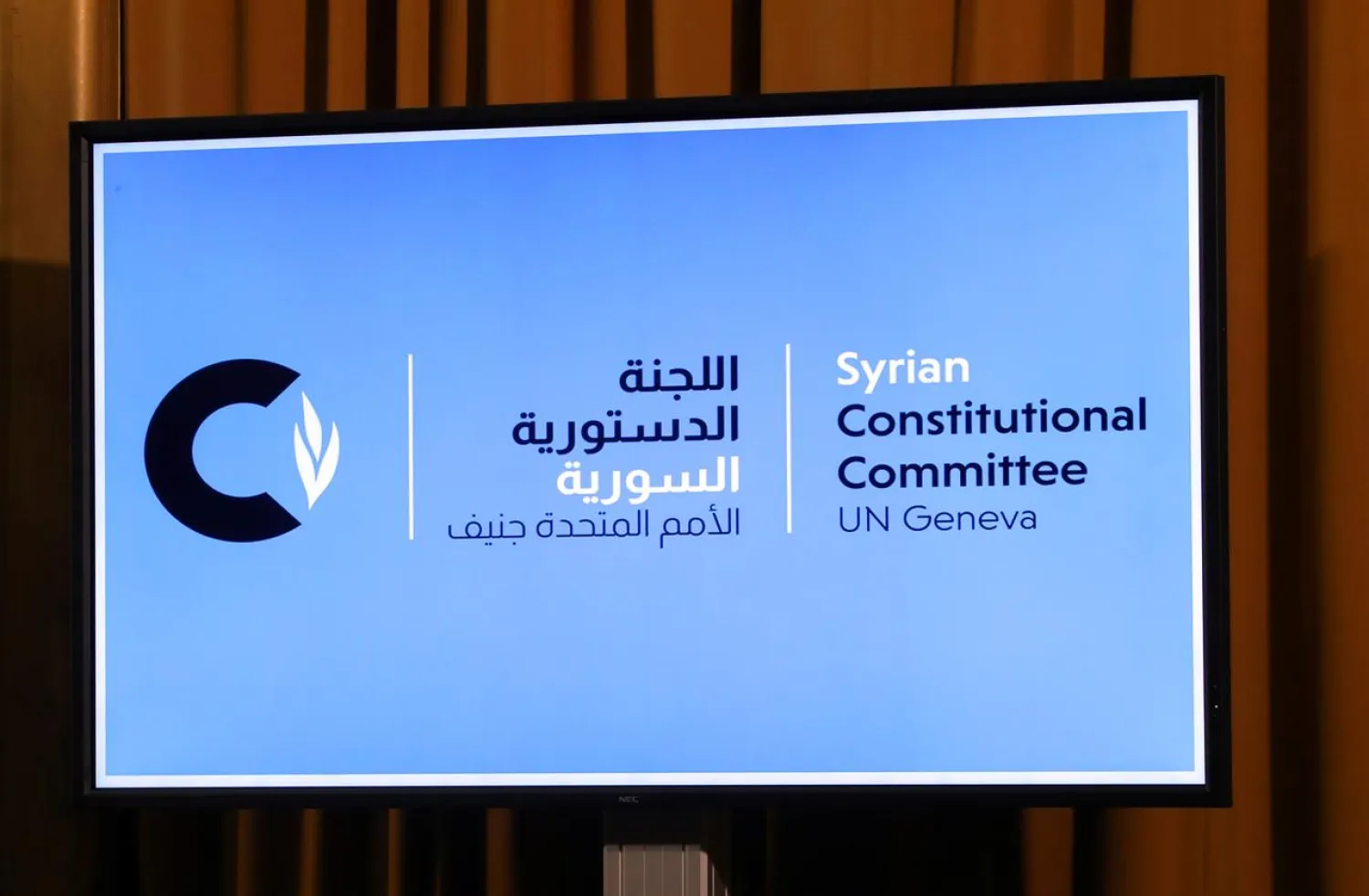 A sign is pictured during the first meeting of the new Syrian Constitutional Committee at the United Nations in Geneva, Switzerland, October 30, 2019. REUTERS/Denis Balibouse