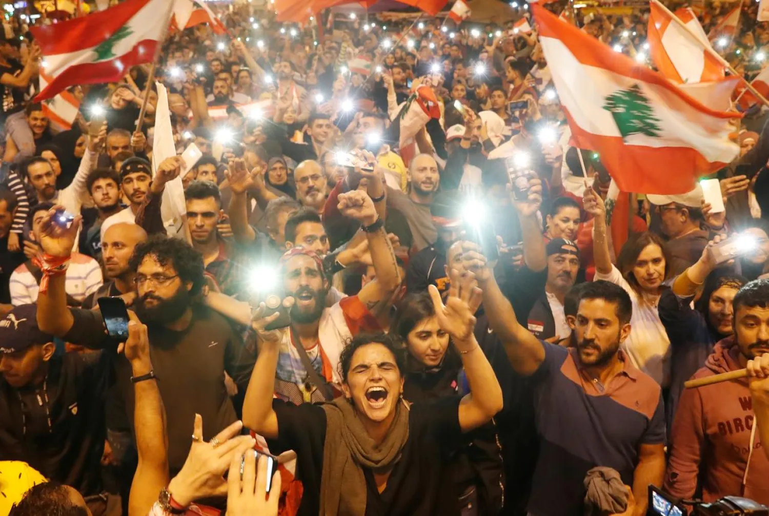 Demonstrators shout during an anti-government protest in Tripoli, Lebanon, November 2, 2019. (Reuters)