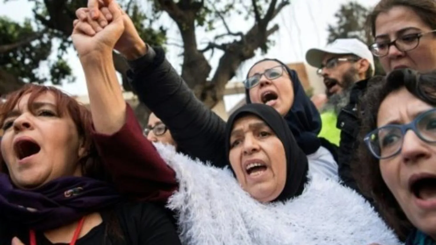Supporters of Morocco's al-Hirak al-Shaabi movement shout slogans calling for the release of the movement's members outside the Casablanca Court of Appeals (File Photo: AFP)
