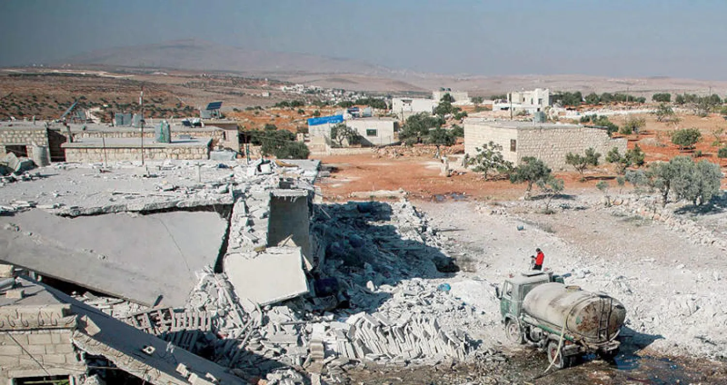 بعد غارة على ريف حلب الغربي أمس (أ.ف.ب)