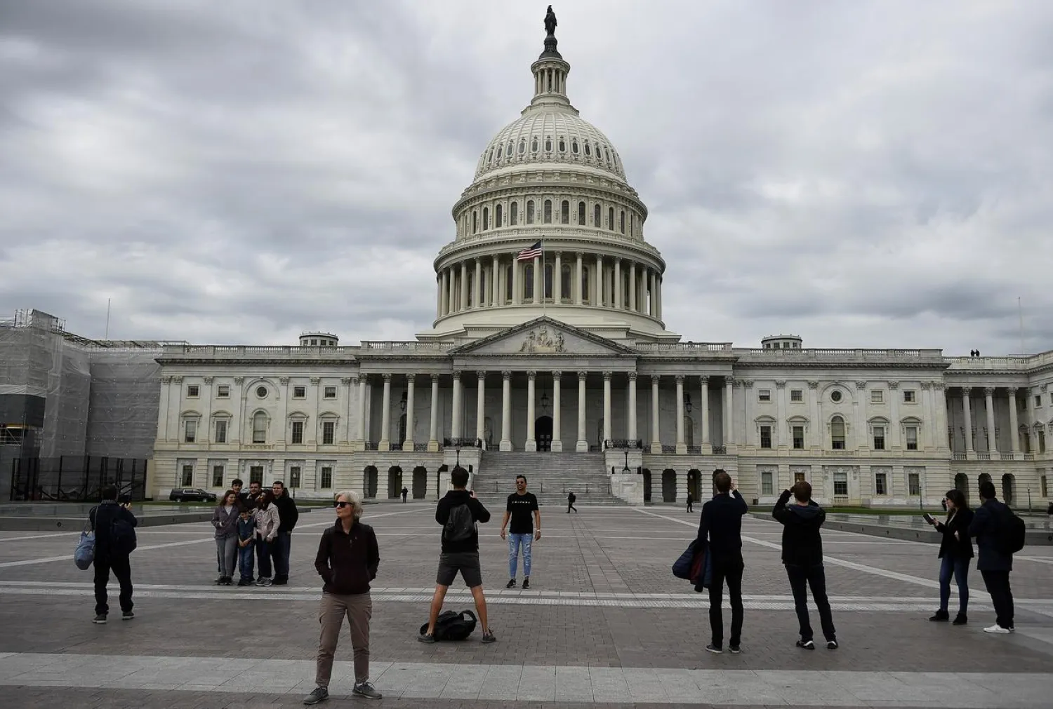 Tourists take pictures and selfies outside Capitol Hill in Washington, D.C., U.S., April 29, 2019. REUTERS/Clodagh Kilcoyne
