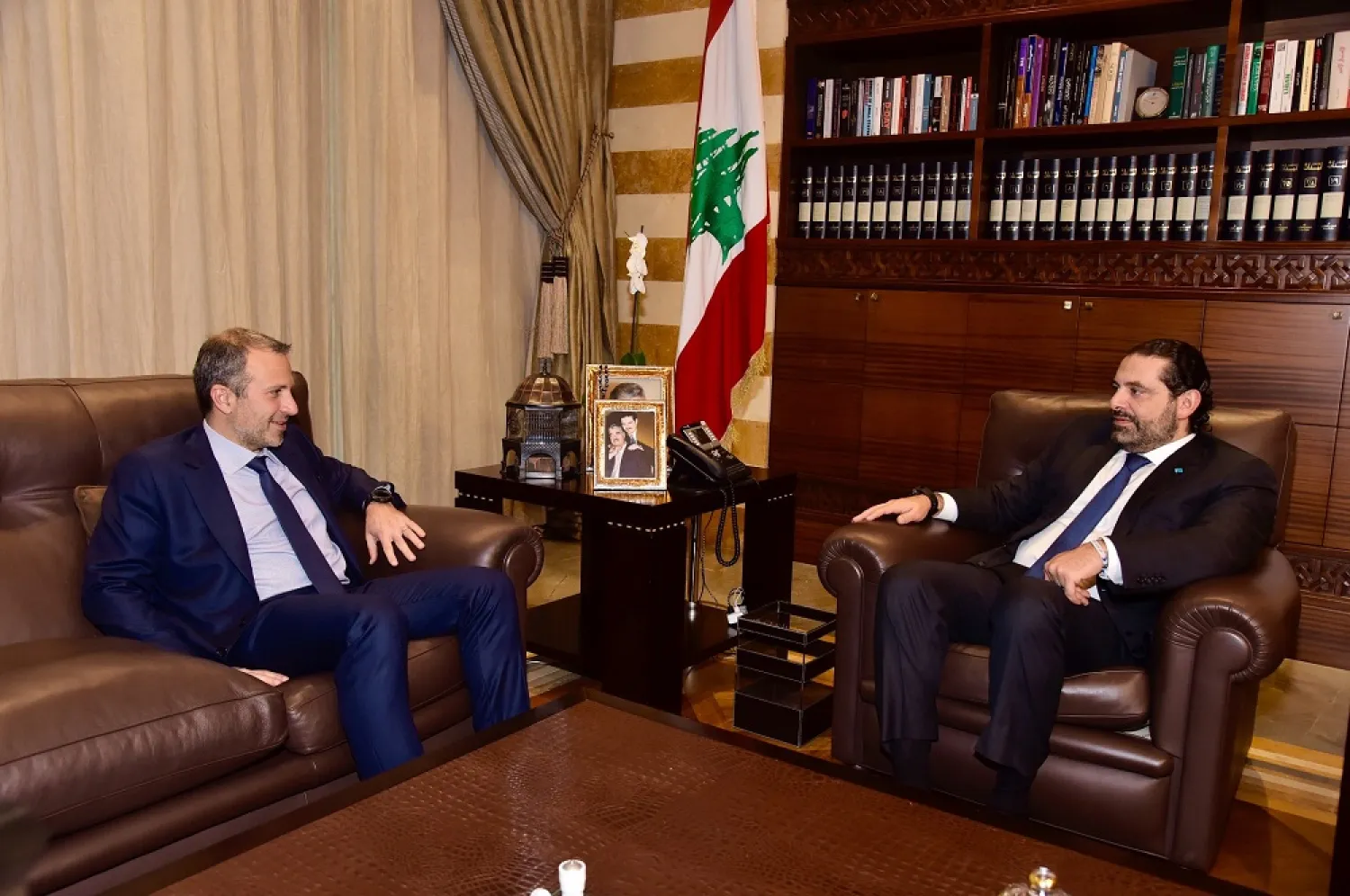 Resigned Lebanese PM Saad Hariri holds talks with FPM chief Gebran Bassil in Beirut. (NNA file photo)
