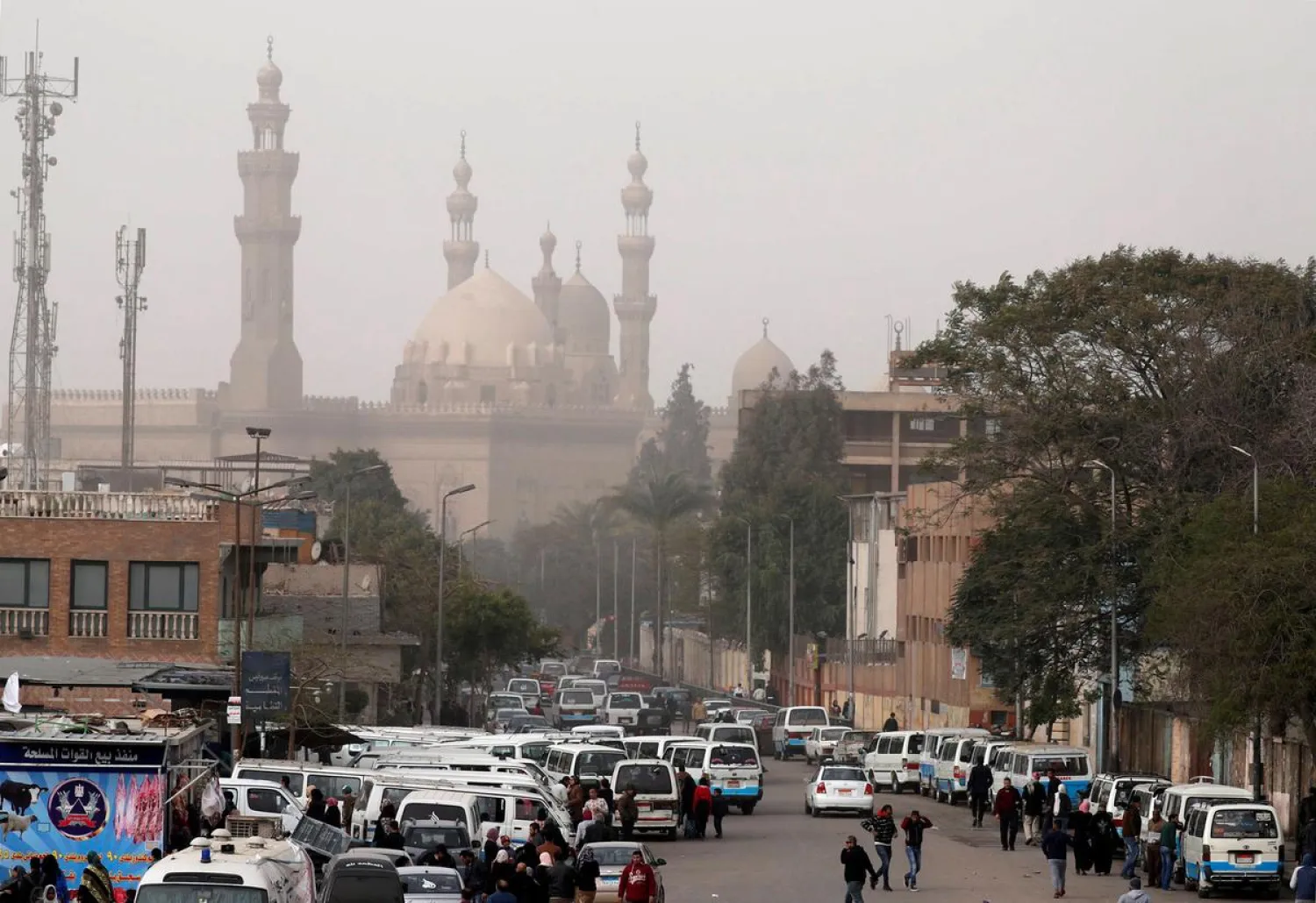 The minarets of Sultan Hassan Mosque and the Al-Rifai Mosque are seen as a traffic jam forms during a sandstorm in Cairo, Egypt January 6, 2019. (Reuters)