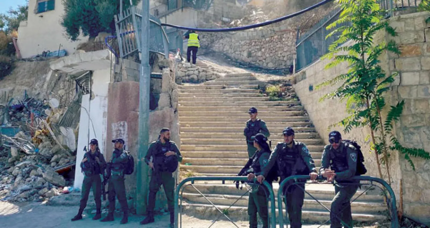 قوات إسرائيلية تهدم منزل فلسطيني في بلدة سلوان قرب القدس الثلاثاء (وفا)