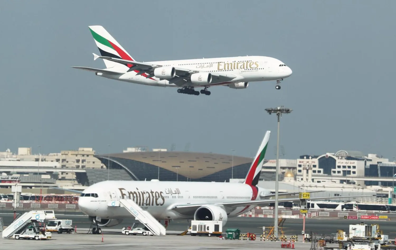 FILE PHOTO: Emirates Airlines Airbus A380-800 plane approaches for landing at Dubai Airports in Dubai, United Arab Emirates, December 26, 2018. REUTERS/ Hamad I Mohammed/File Photo
