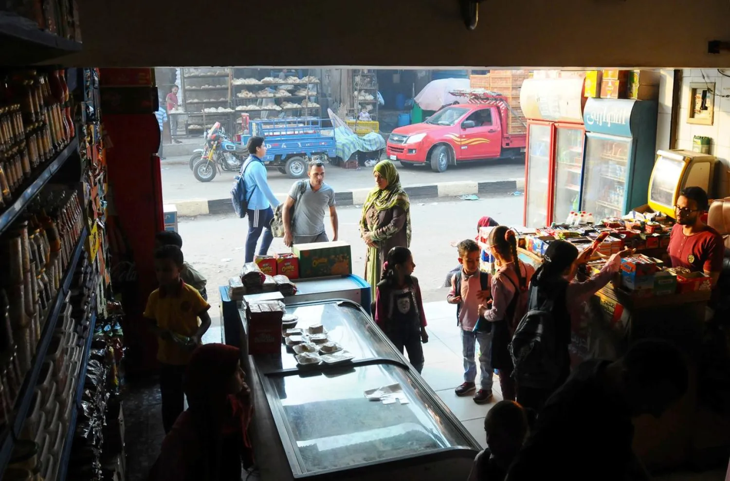 People shop inside a market in Giza, Egypt October 2, 2019. (Reuters)