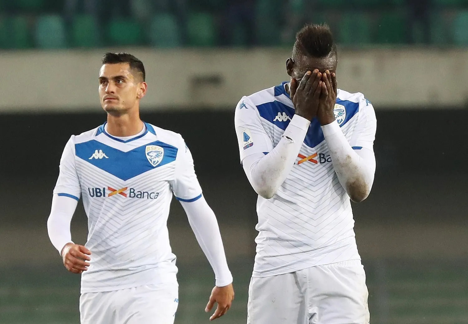 Brescia's Mario Balotelli, right, reacts at the end of the Italian Serie A match between Verona and Brescia at the Bentegodi stadium in Verona, Italy, Sunday, Nov. 3, 2019. (AP)