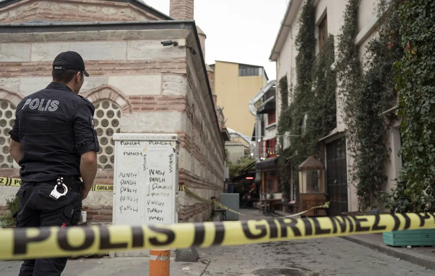 A police officer stands at the site after former British army officer who helped found the White Helmets in Syria, James Le Mesurier's body was found in Istanbul, Turkey, November 11, 2019. (AP)