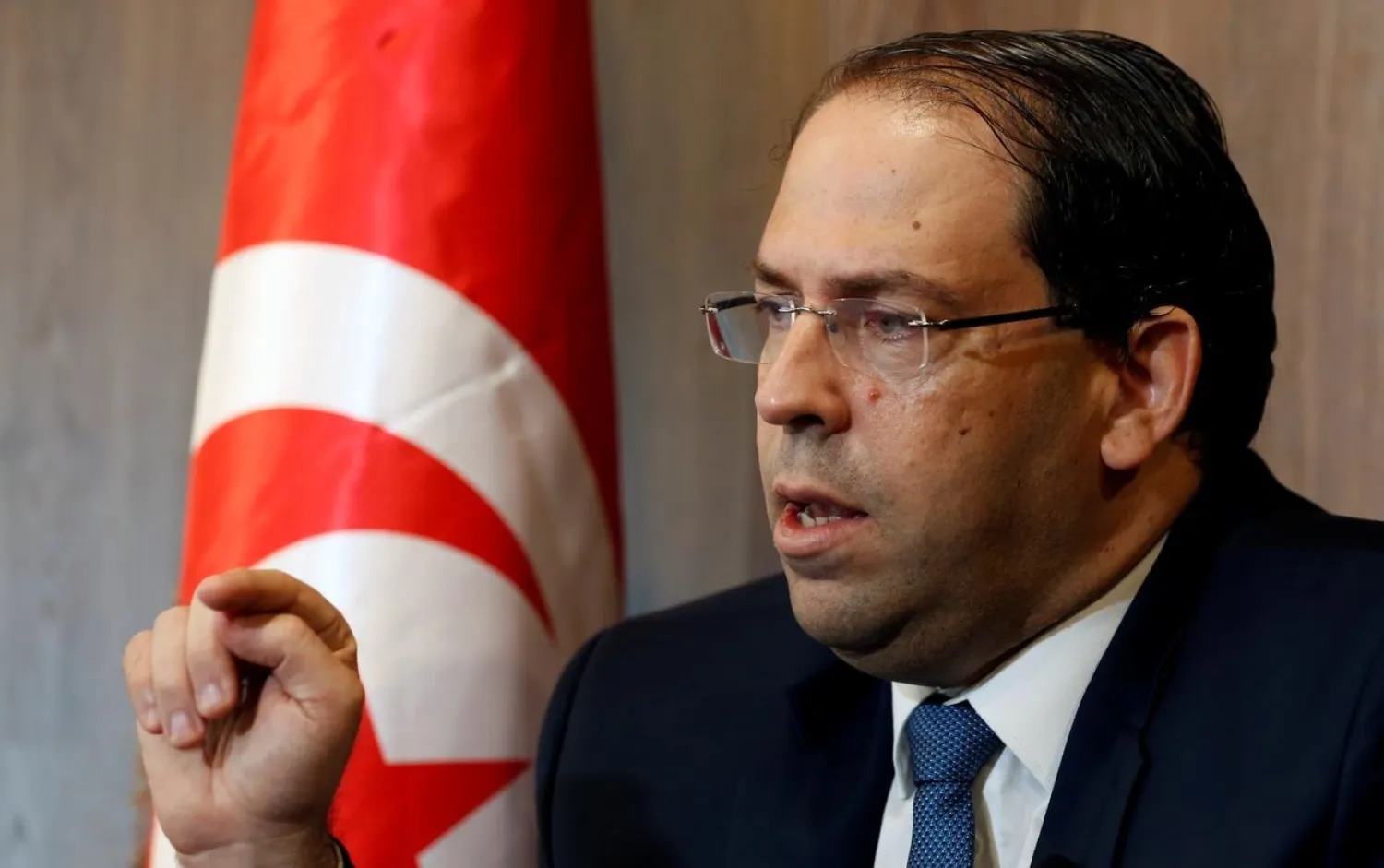 Tunisia's Prime Minister Youssef Chahed gestures during an interview with Reuters in Tunis, Tunisia, August 29, 2019. (Reuters)