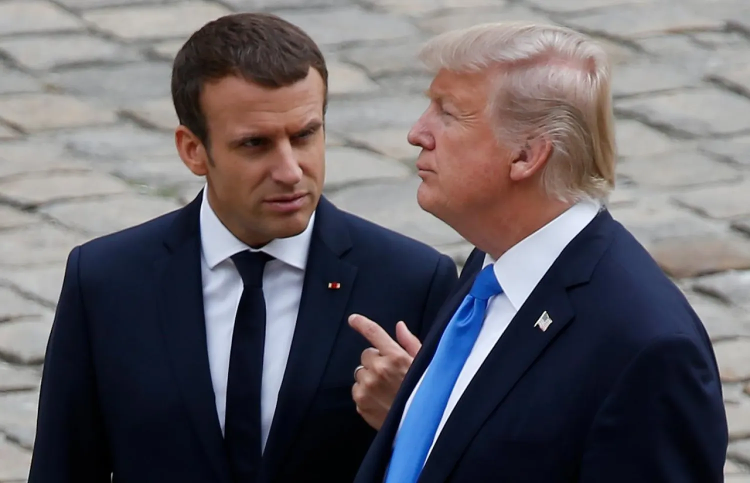 US President Donald Trump and French President Emmanuel Macron discuss Syria and Iran. (Reuters) 
