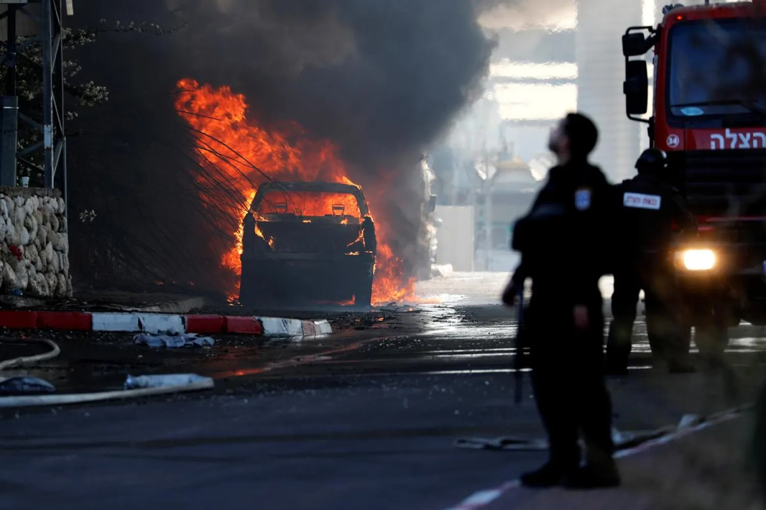 A vehicle burns after a factory caught on fire in Sderot, southern Israel November 12, 2019. (Reuters)