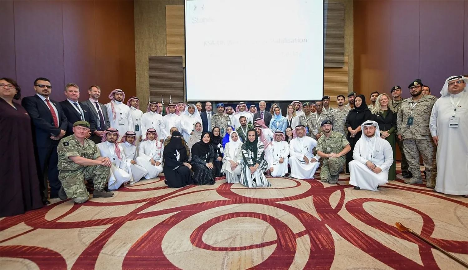SDRPY Saudi Ambassador to Yemen Mohammed Al Jabir and UK Ambassador to Yemen Michael Aron in a group photo with participants in the stabilization workshop (SDRPY)
