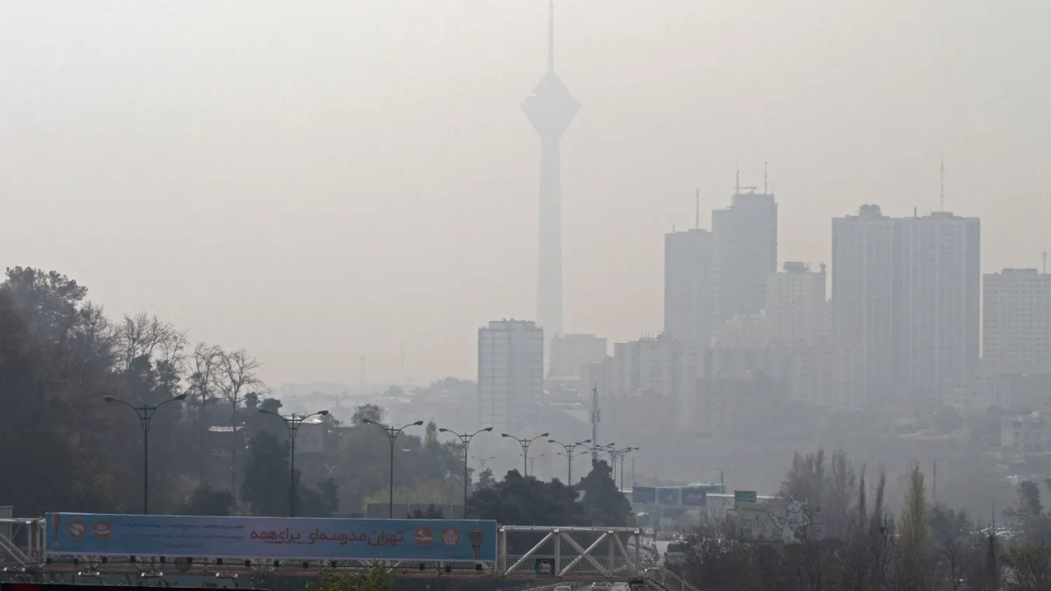 In the Nov. 14, 2016, Tehran is shrouded in a blanket of brown-white smog as the first of the winter's heavy pollution hit the city. (Getty Images)