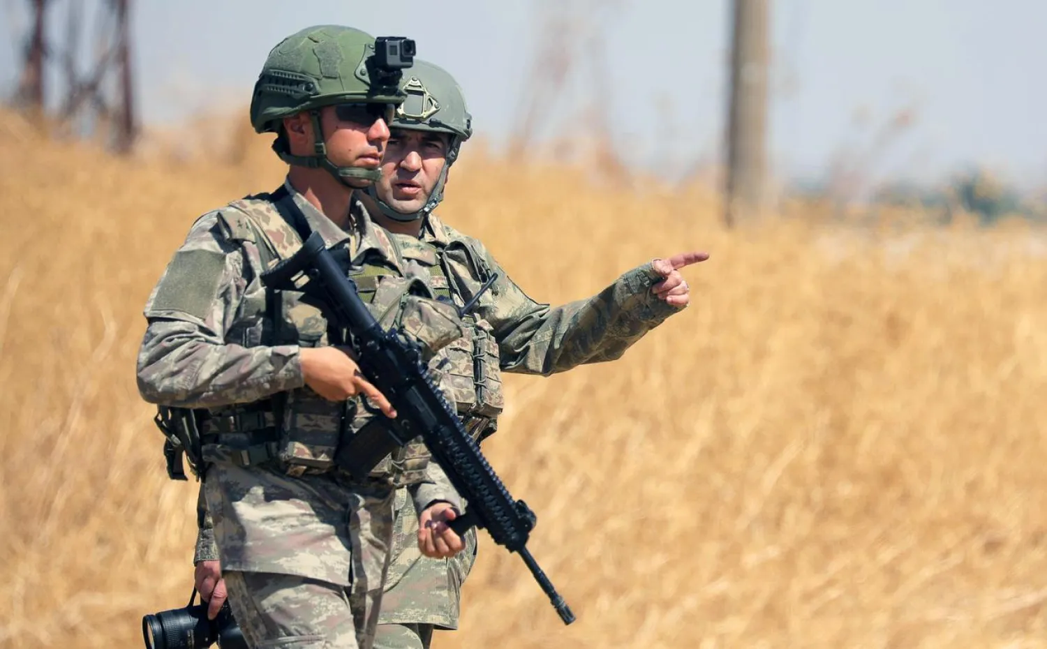 Turkish soldiers walk together during a joint US-Turkey patrol, near Tel Abyad, Syria September 8, 2019. REUTERS/Rodi Said