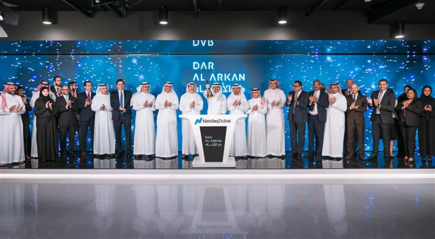 Yousef Bin Abdullah al-Shalash, the Chairman of Dar Al-Arkan Real Estate Development Company, rings the bells for inaugurating the market in celebration of issuing Sukuk. Asharq Al-Awsat Arabic
