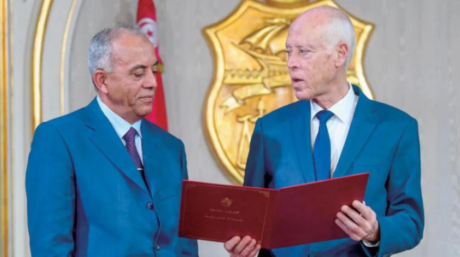 Cumhurbaşkanı Kays Said, 15 Kasım’da Kartaca’da yeni hükümeti kurmakla görevli olan El-Habib el-Cemli’yi karşıladı (AFP)