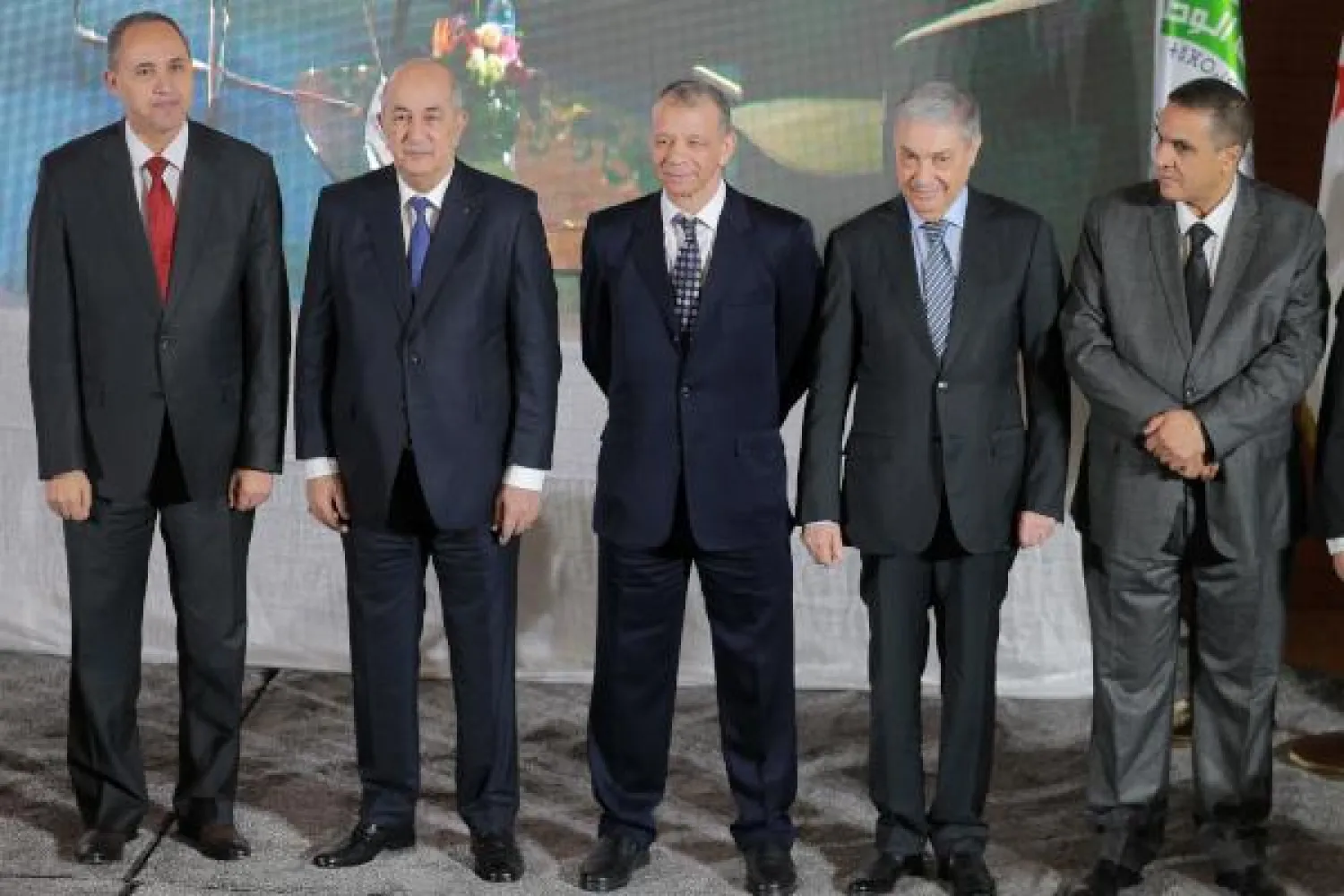 Algerian presidential candidates, former culture minister Azzedine Mihoubi (L), former prime ministers Abdelmadjid Tebboune (2nd-L) and Ali Benflis (3rd-R), head of the Mostakbal Movement party Abdelaziz Belaid (2nd-R), and former tourism minister Abdelkader Bengrina (3rd-L) stand together during a press conference after signing a charter of ethics in the capital Algiers on November 16, 2019. (Photo by - / AFP)
