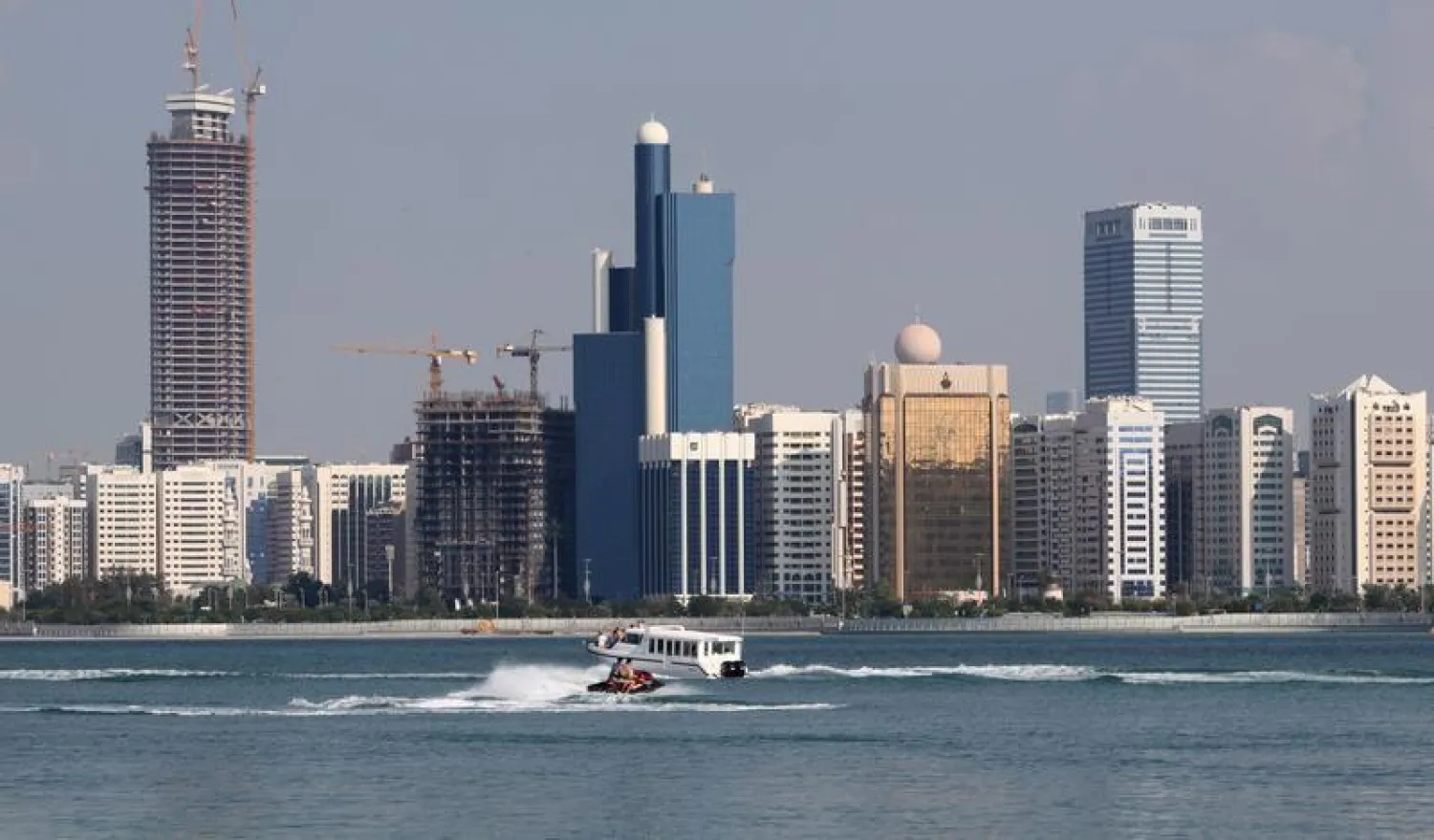 File Photo: A general view of the Abu Dhabi skyline is seen, December 15, 2009. REUTERS/Ahmed Jadallah

