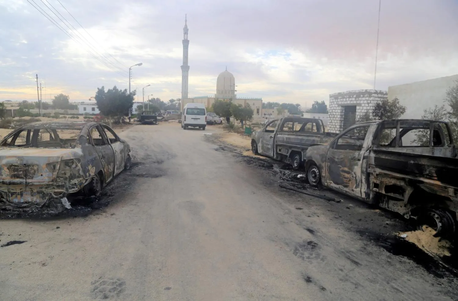 FILE PHOTO: Damaged vehicles are seen after a bomb exploded at Al Rawdah mosque in Bir Al-Abed, Egypt November 25, 2017. REUTERS/Mohamed Soliman/File Photo
