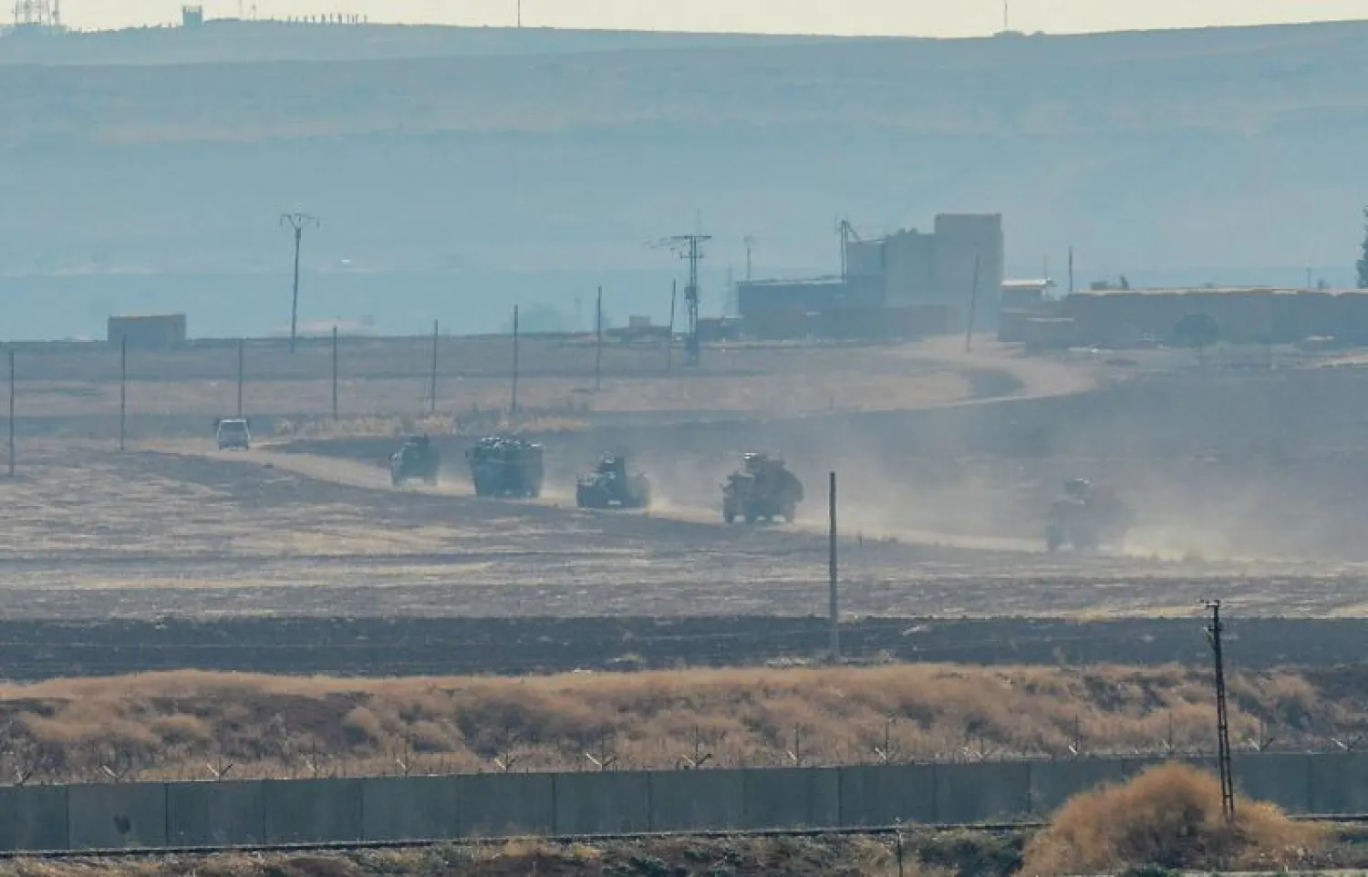 قوات تركية وروسية في دورية مشتركة في شمال شرق سوريا (أ.ف.ب)