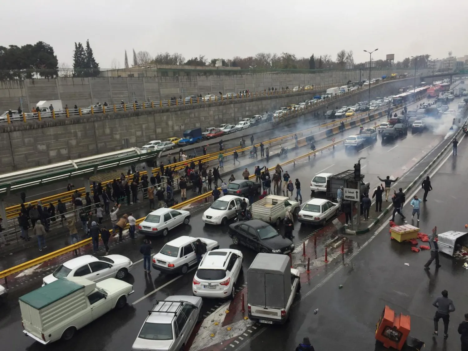 FILE PHOTO: People stop their cars in a highway to show their protest for increased gas price in Tehran, Iran November 16, 2019. Nazanin Tabatabaee/WANA (West Asia News Agency) via REUTERS