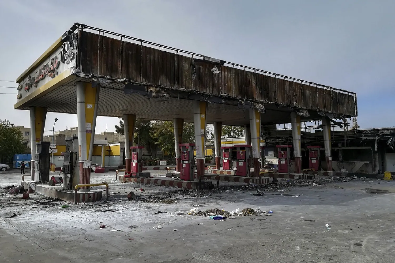 This photo released by ISNA shows a gas station that was burned during protests that followed authorities' decision to raise gasoline prices, in Tehran, Iran, Nov. 17, 2019. (AP)