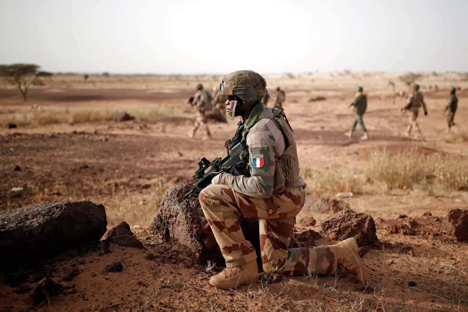 FILE PHOTO: Troops from the Malian Armed Forces and French soldiers conduct a joint patrol during the regional anti-insurgent Operation Barkhane in Inaloglog, Mali, October 17, 2017. REUTERS/Benoit Tessier/File Photo