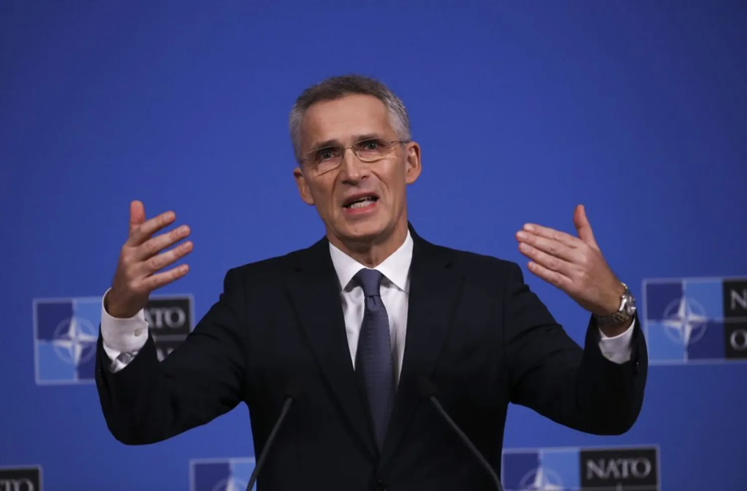NATO Secretary-General Jens Stoltenberg gestures as he answers a question during a news conference at NATO headquarters in Brussels, Tuesday, Nov. 19, 2019. (AP Photo/Francisco Seco)