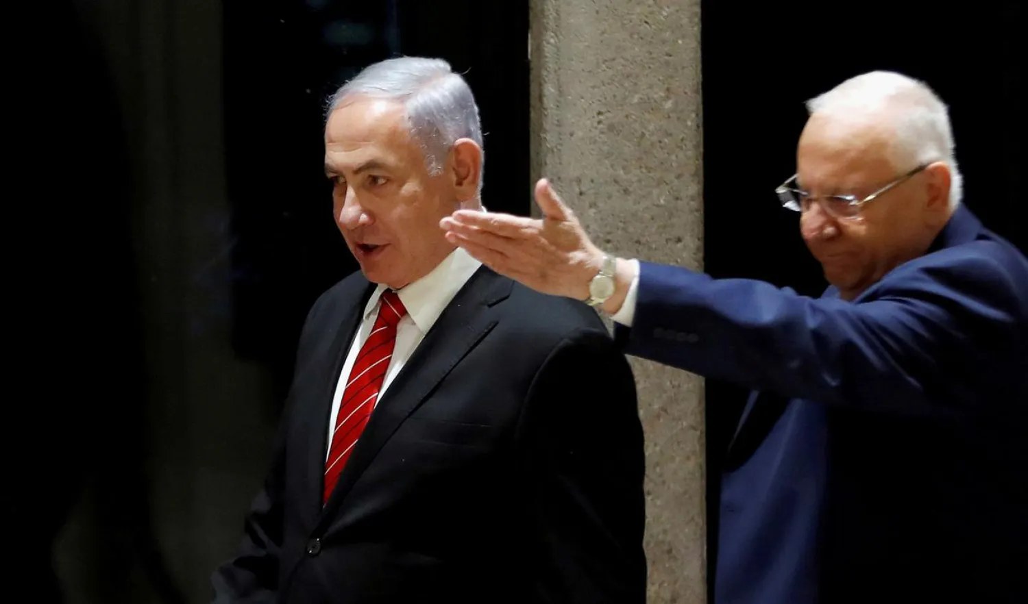FILE PHOTO: Israeli President Reuven Rivlin and Prime Minister Benjamin Netanyahu arrive at a nomination ceremony at the President's residency in Jerusalem September 25, 2019. REUTERS/Ronen Zvulun/File Photo