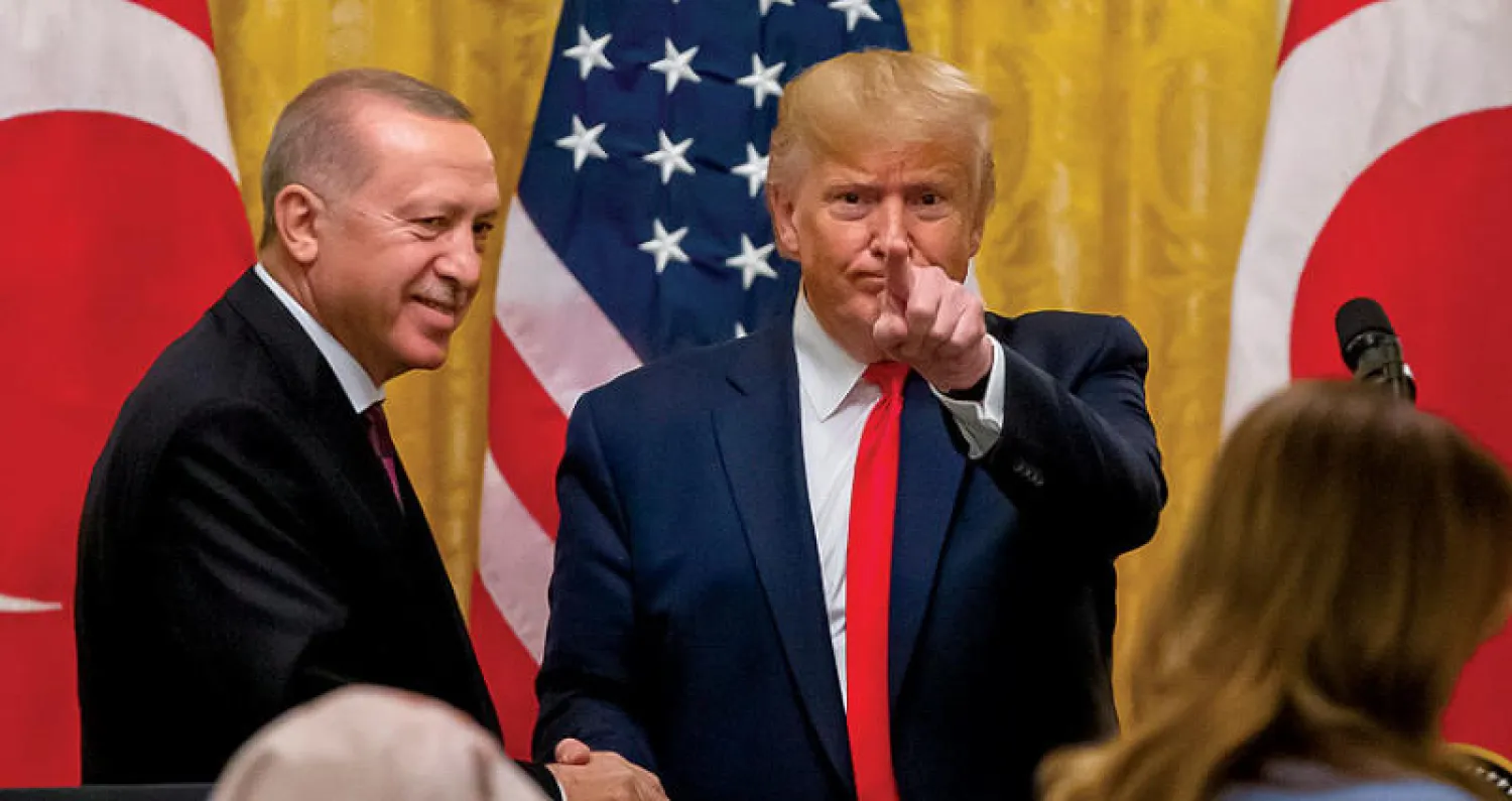 ترمب وإردوغان في نهاية مؤتمر صحافي بالبيت الأبيض في 13 نوفمبر الحالي (إ.ب.أ)