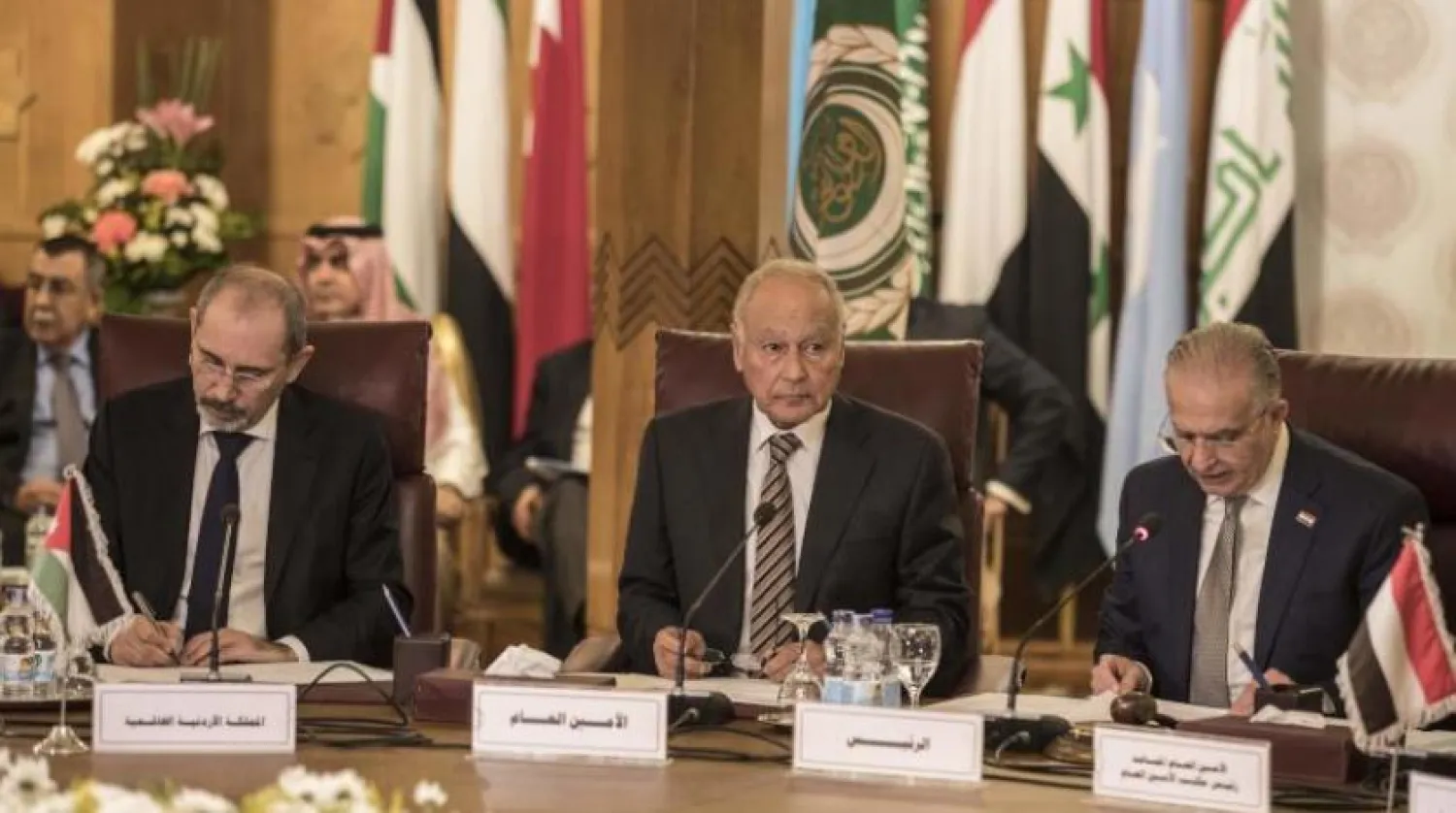 (L to R) Arab League Secretary-General Ahmed Aboul Gheit, Palestinian Foreign Minster Riyad al-Maliki and Iraqi Foreign Minister Mohamed Alhakim attend a joint press conference following an emergency meeting at the Arab League headquarters in the Egyptian capital Cairo, on November 25, 2019. (Photo by Khaled DESOUKI / AFP)