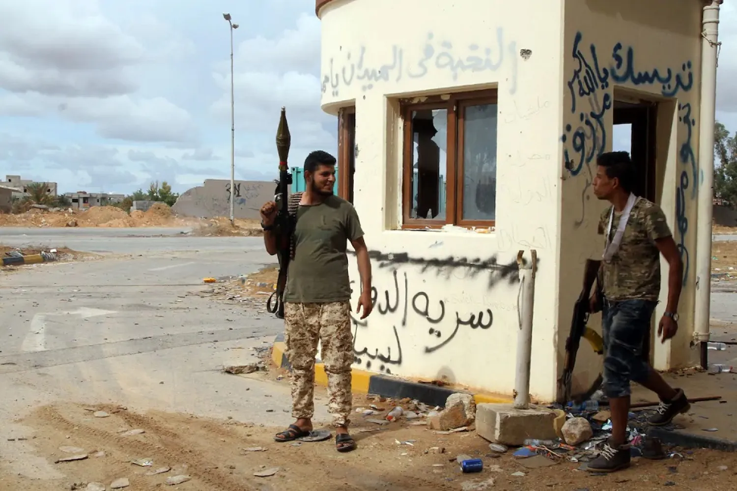 GNA fighters gather on October 8 at the frontline, where clashes have been raging against the LNA in the Salah al-Din area south of the Libyan capital, Tripoli. (Getty Images)