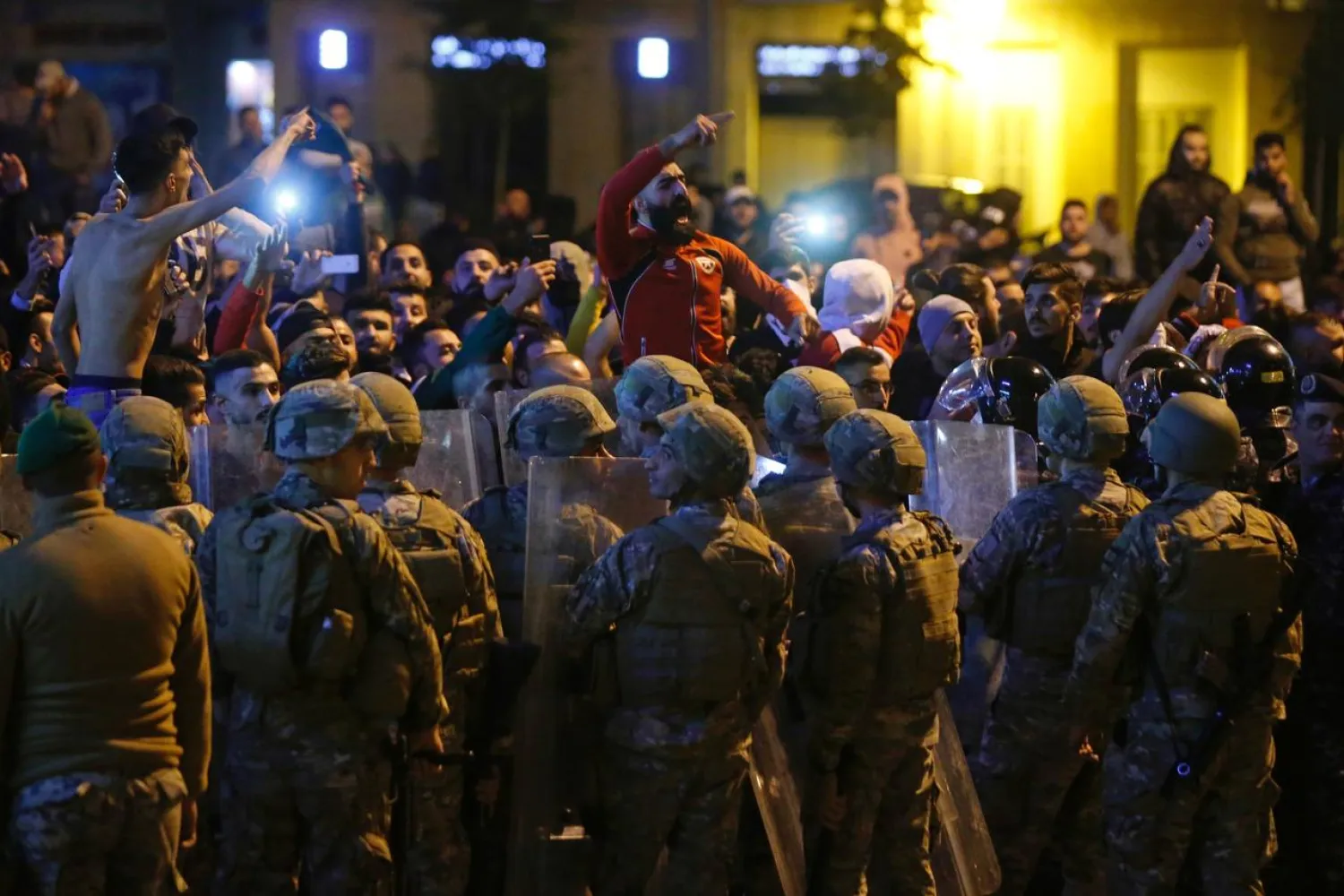 Lebanese army soldiers and riot police are deployed after clashes broke out between anti-government demonstrators and supporters of the Shiite movements Hezbollah and Amal in Beirut, Lebanon, November 25, 2019. REUTERS/Mohamed Azakir