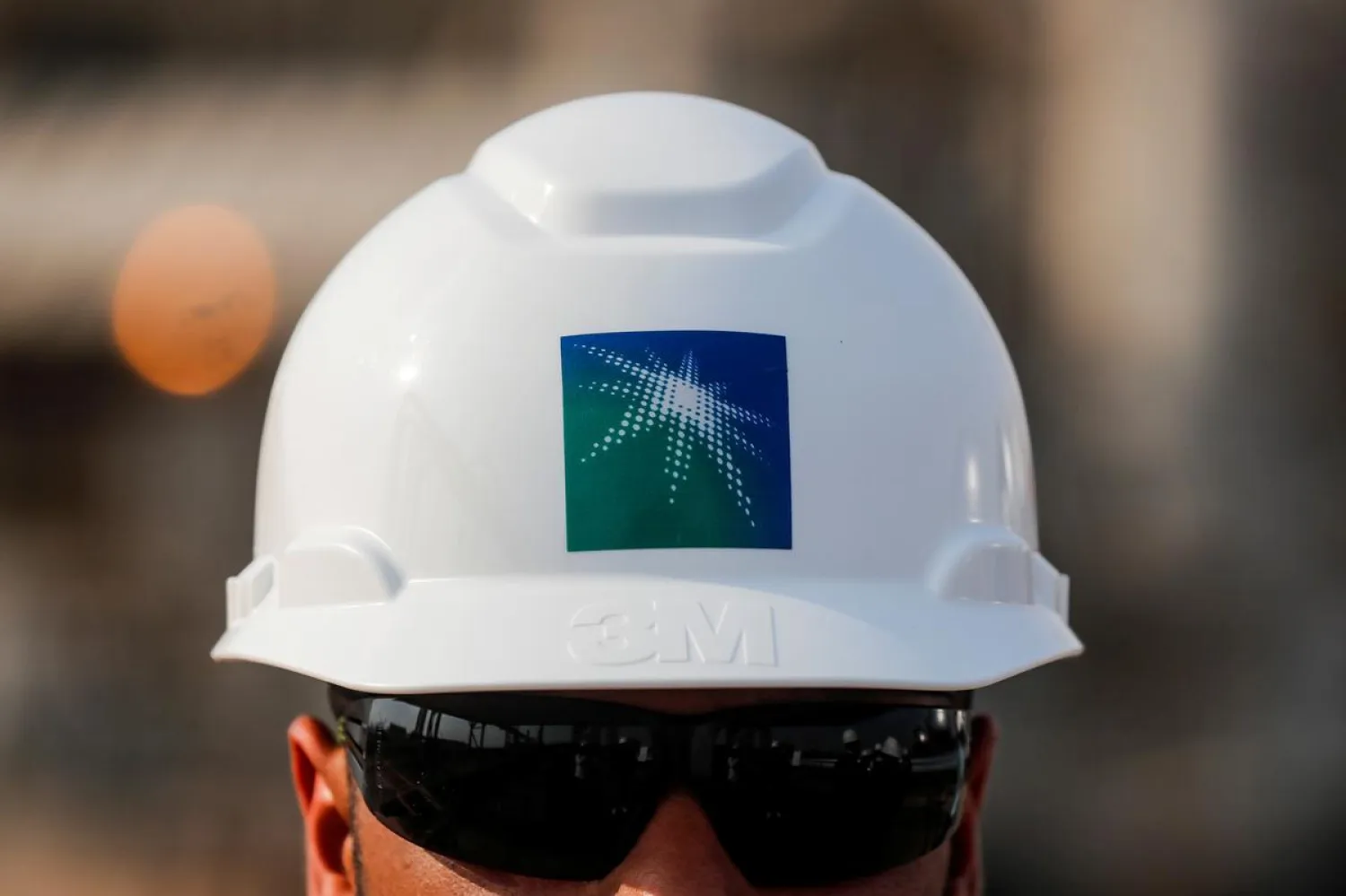 An employee in a branded helmet is pictured at Saudi Aramco oil facility in Abqaiq, Saudi Arabia (File Photo: Reuters)