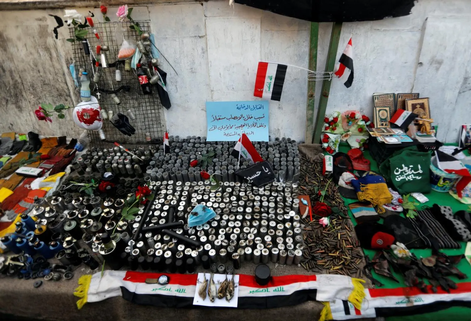 A makeshift memorial with personal belongings of those who were killed at an anti-government protests is displayed at Tahrir Square in Baghdad, Iraq, November 23, 2019. (Reuters)