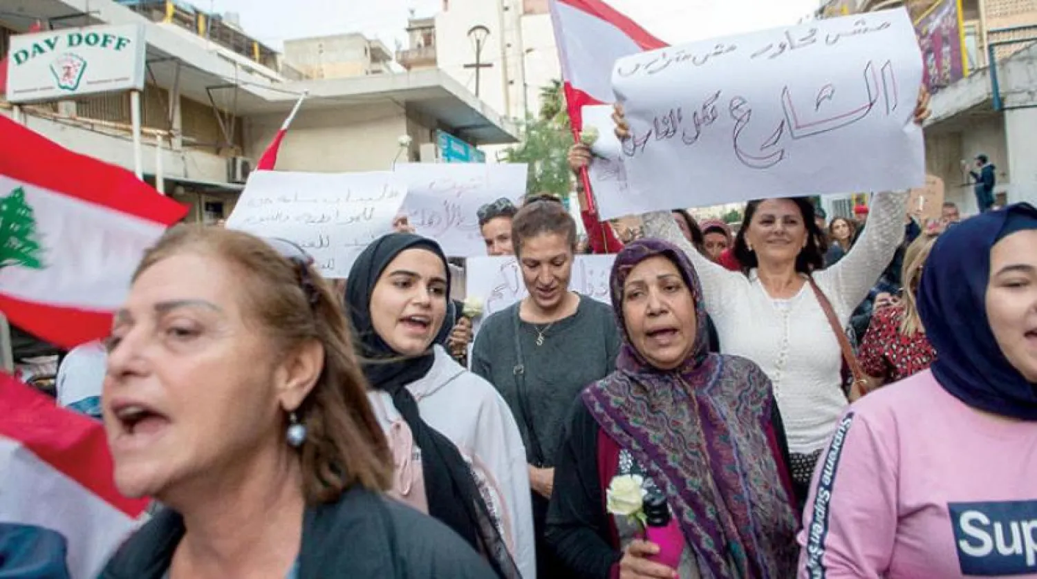 Mothers and residents of Ain el-Rummaneh and Shiyyah marched together in a solidarity rally, following overnight unrest in the area. (Photo: Nabil Ismail)