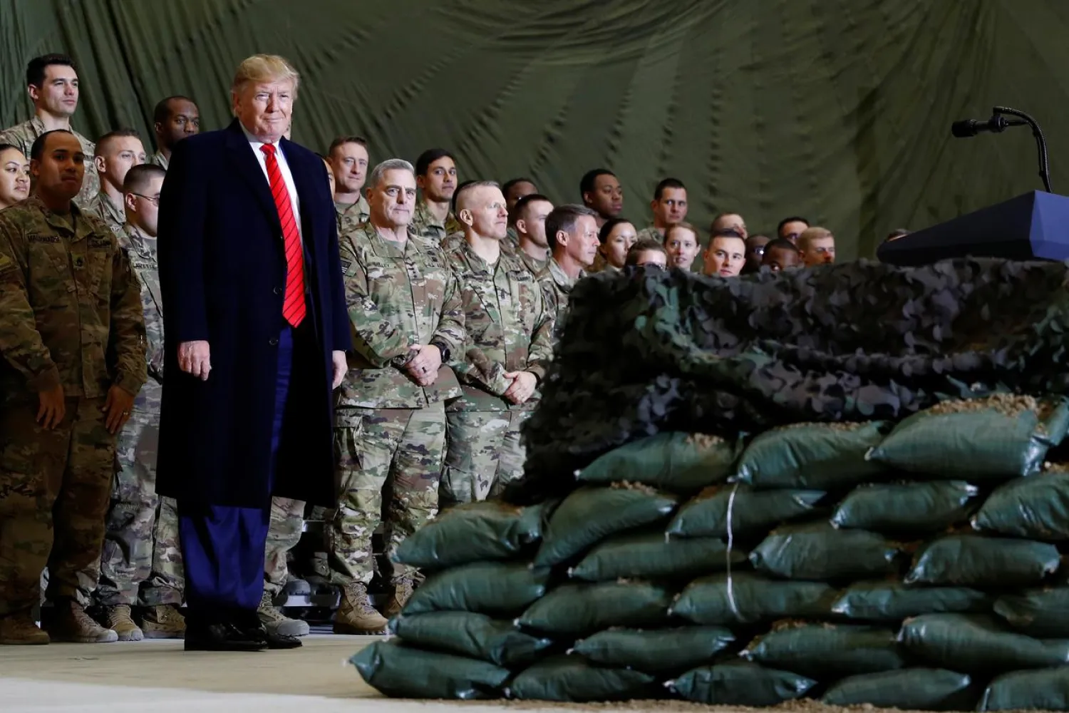 FILE PHOTO: U.S. President Donald Trump delivers remarks to U.S. troops in an unannounced visit to Bagram Air Base, Afghanistan, November 28, 2019. REUTERS/Tom Brenner/File Photo
