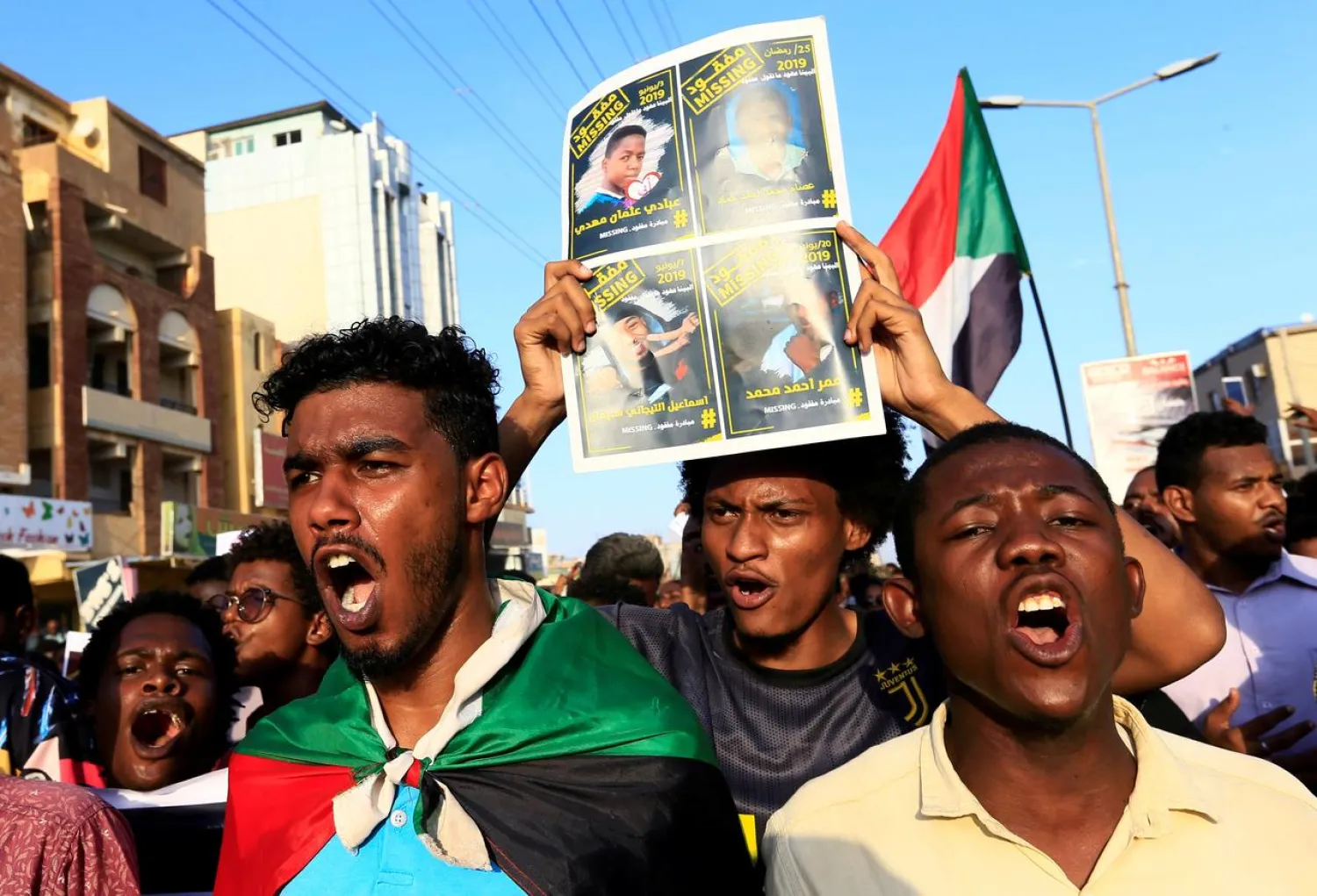 FILE PHOTO: Sudanese protesters chant slogans during a rally calling for the former ruling party to be dissolved and for ex-officials to be put on trial in Khartoum, Sudan, October 21, 2019. REUTERS/Mohamed Nureldin Abdallah/File Photo