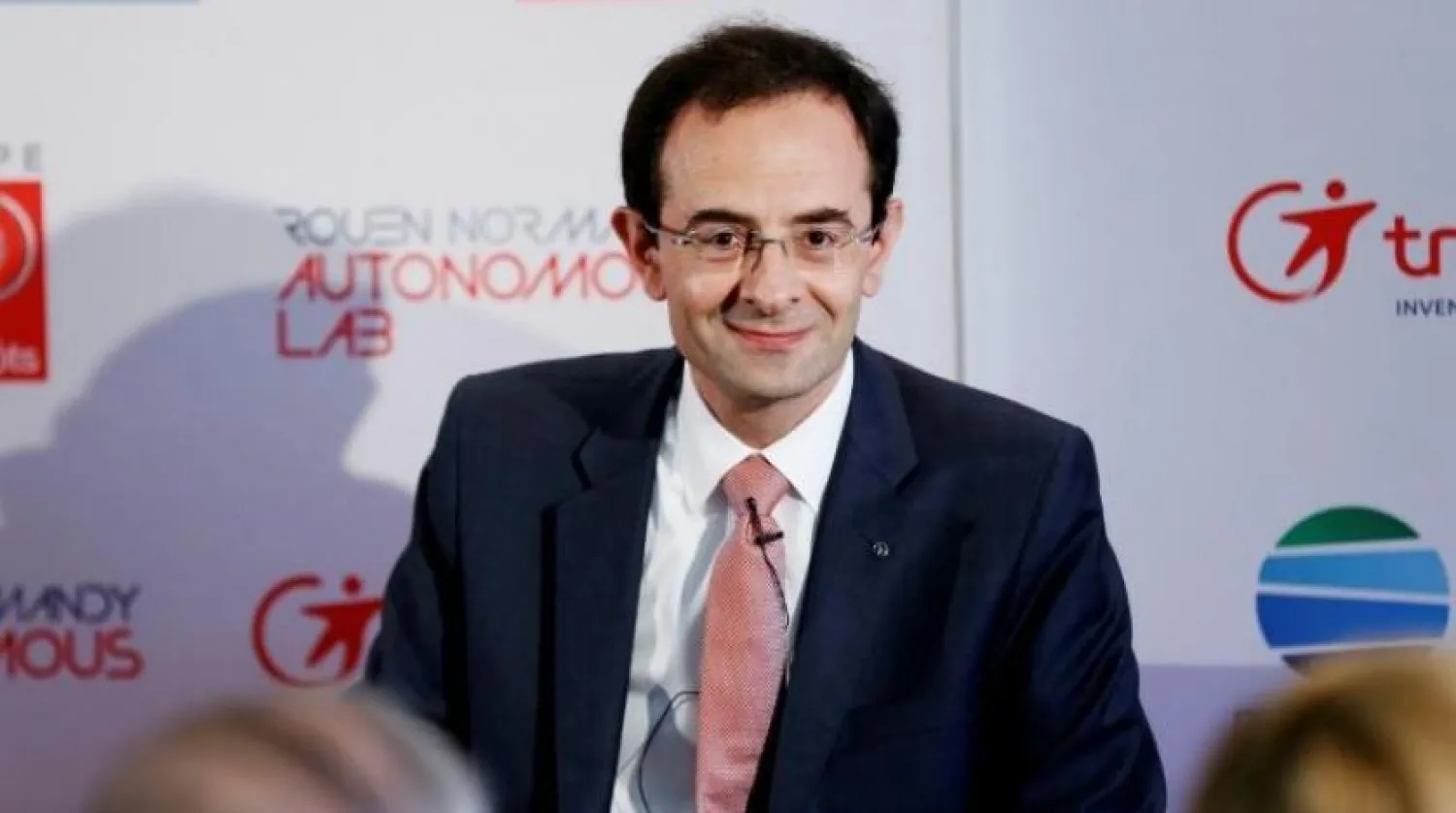 Hadi Zablit looks on during the presentation of the autonomous car service in the northwestern city of Rouen on June 26, 2018. CHARLY TRIBALLEAU / AFP