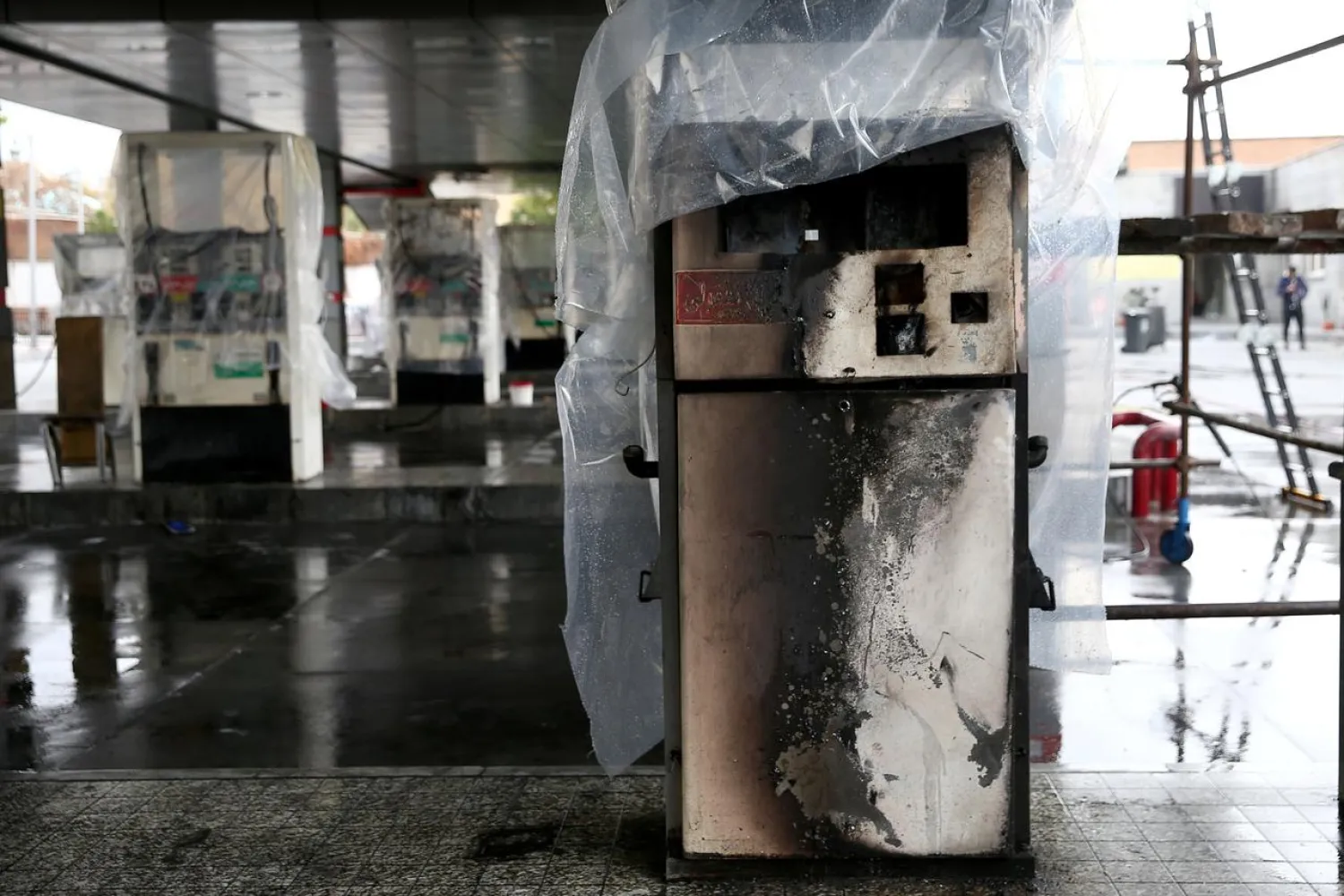 Destroyed petrol pumps are pictured at a gas station, after protests against increased fuel prices, in Tehran, Iran November 20, 2019. (Reuters)