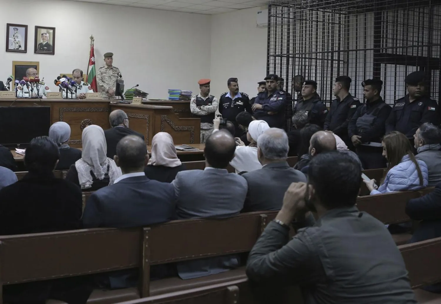 Israeli Konstantin Kotov stands in the defendant's cage at a state security court where he was charged with illegally entering the country and possessing drugs, in Amman, Jordan, Dec. 2, 2019. (AP)