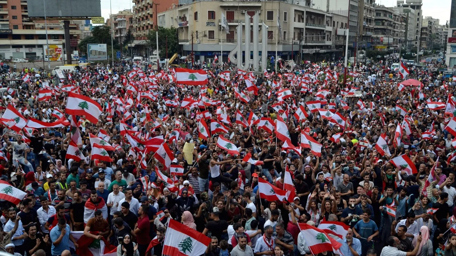 Demonstrators take part in an anti-government protest in Tripoli, Lebanon, Oct. 20, 2019. (Reuters)