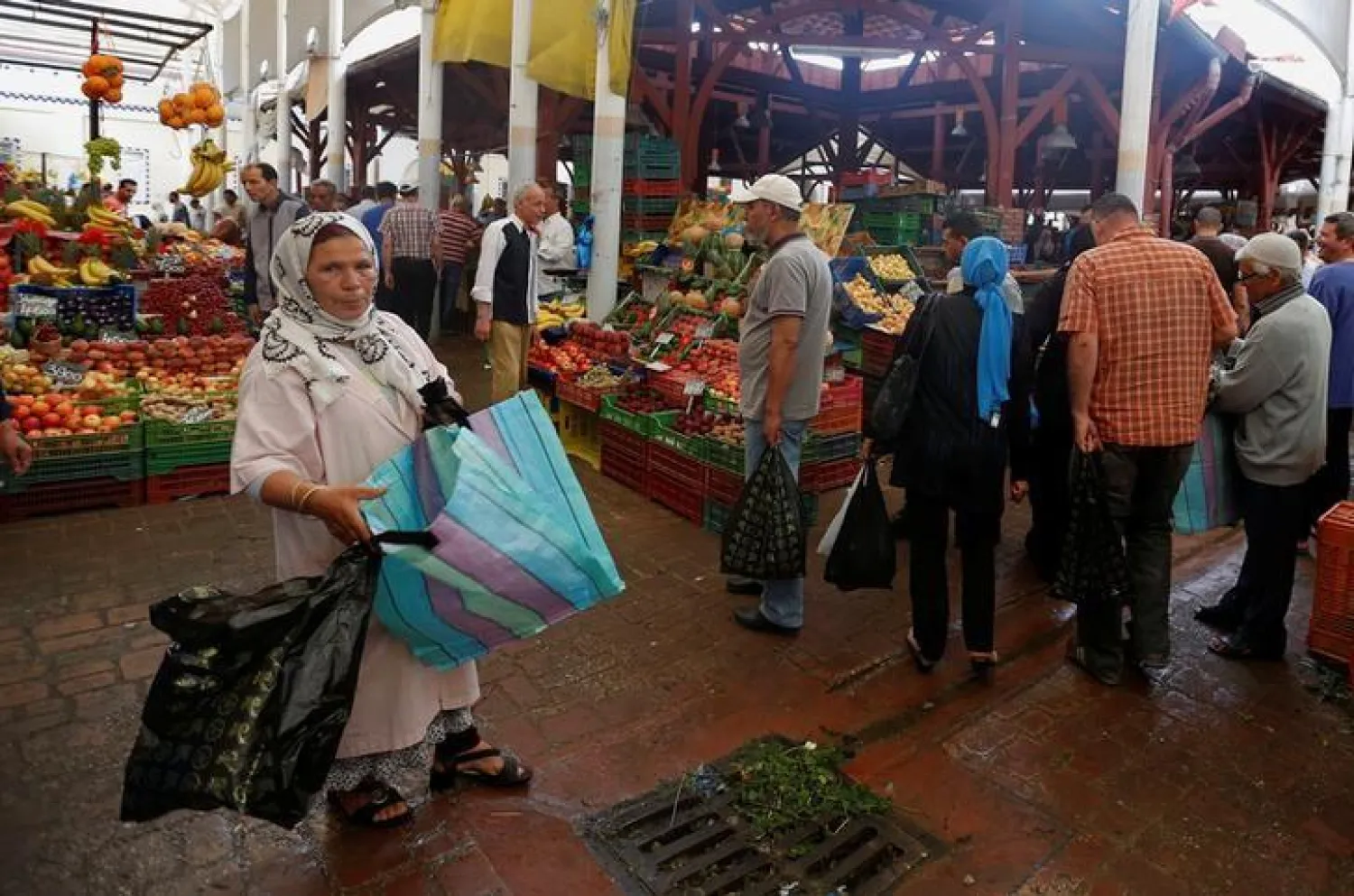 A woman sells plastic bags at a downtown market in Tunis, Tunisia June 1, 2018. REUTERS/Zoubeir Souissi