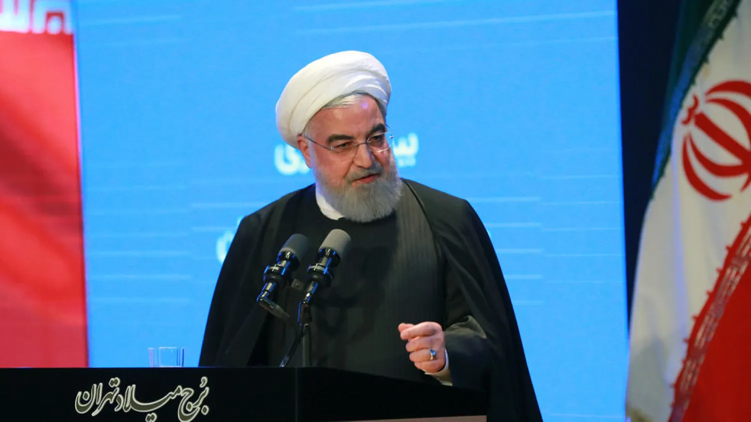 Iranian President Hassan Rouhani said that Tehran is willing to return to the negotiating table if the United States first drops sanctions | AFP