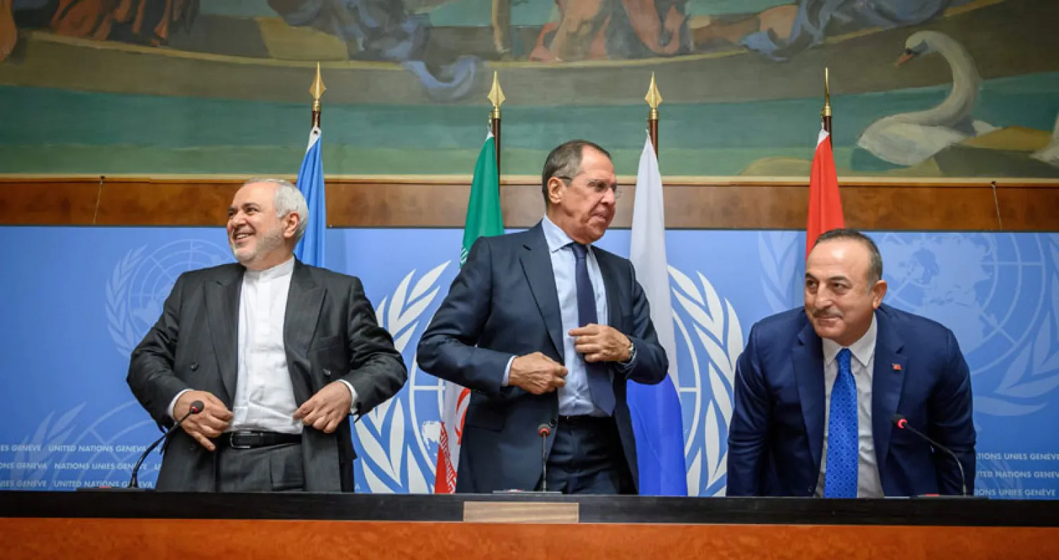 وزراء خارجية روسيا وإيران وتركيا خلال لقائهم في جنيف في نهاية أكتوبر الماضي (أ.ف.ب)