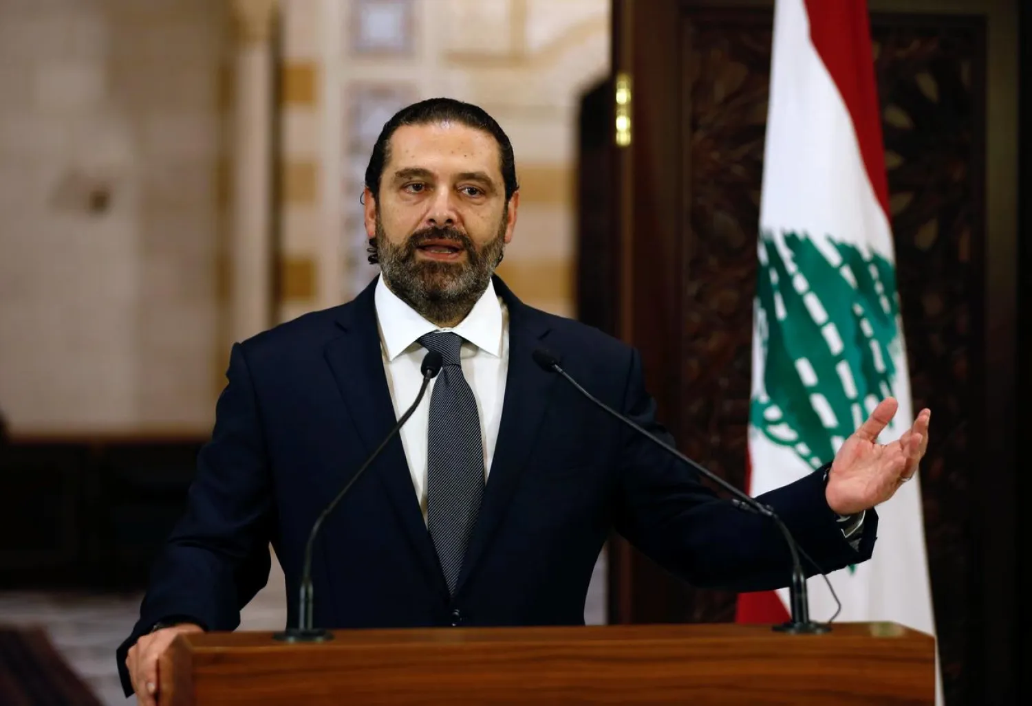 FILE PHOTO: Lebanon's now caretaker Prime Minister Saad Hariri speaks during a news conference in Beirut, Lebanon October 18, 2019. REUTERS/Mohamed Azakir