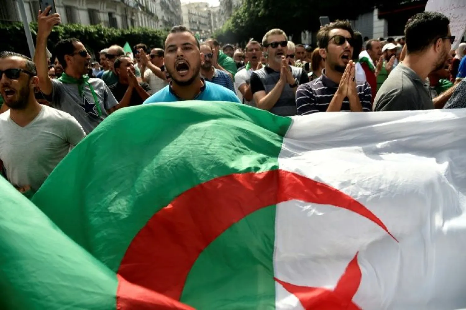 Algerian protesters have been demanding sweeping reforms including the departure of powerful army chief Ahmed Gaid Salah | AFP