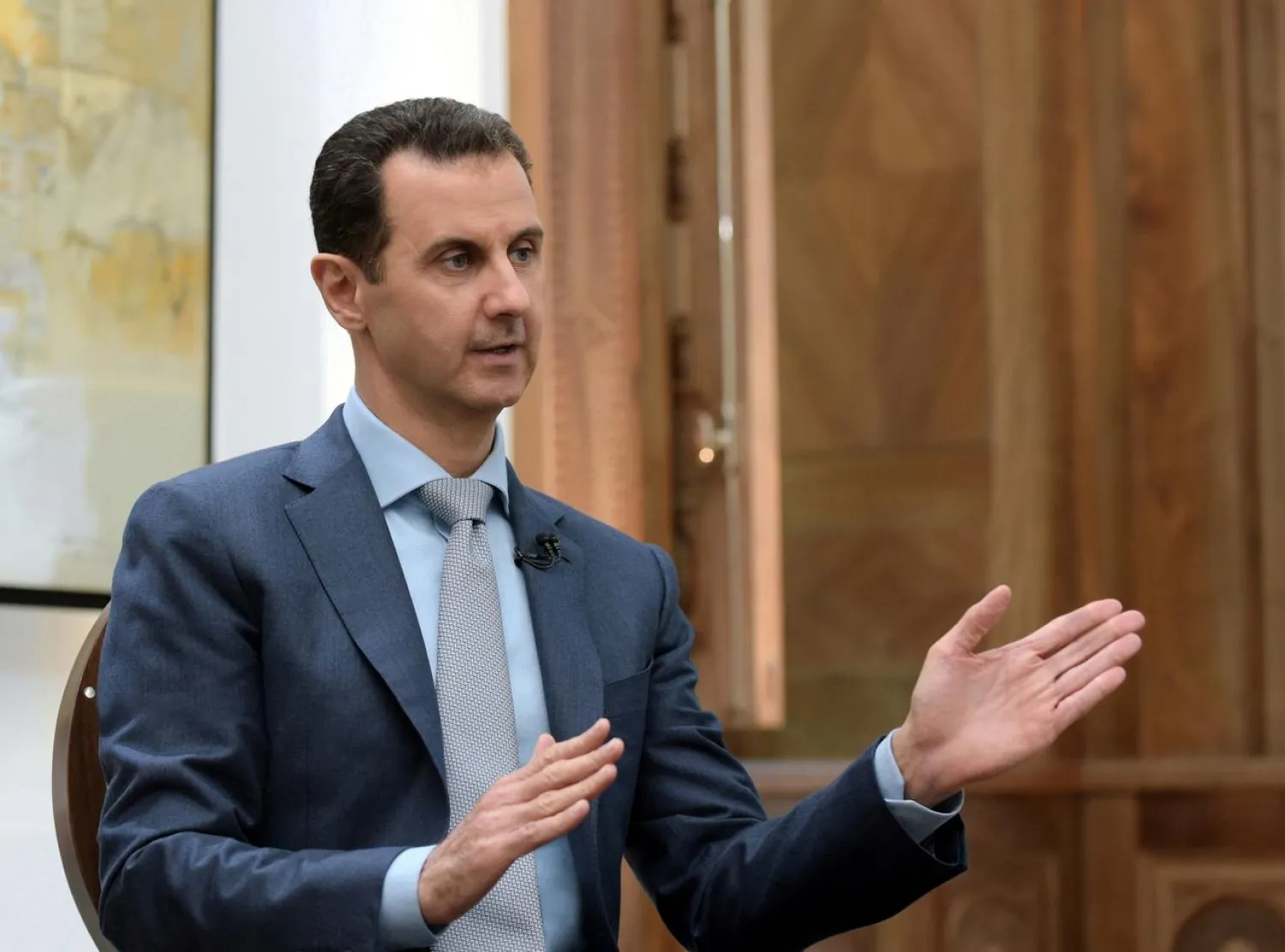 Syria's President Bashar al-Assad speaks during an interview with Yahoo News (SANA Handouts)