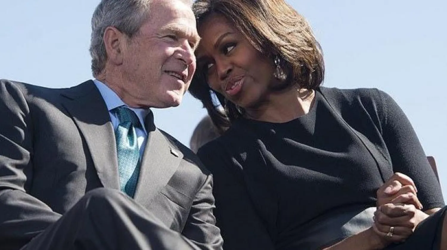 ABD’nin eski Başkanı George W.Bush ve Michelle Obama (AFP)