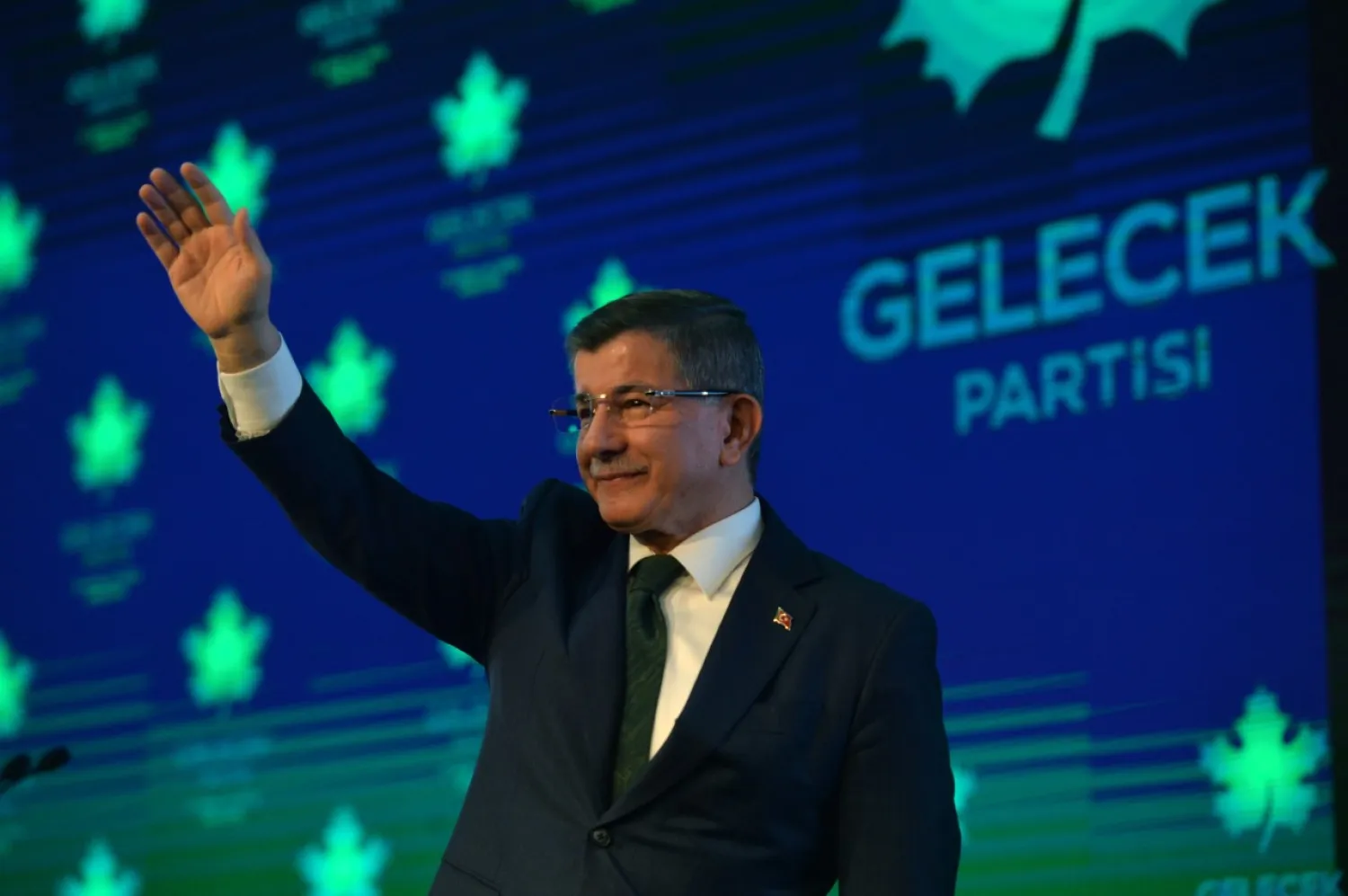 Former Turkish prime minister Ahmet Davutoglu greets his supporters during the presentation of the newly established Gelecek Party (The Future Party) in Ankara, Turkey, 13 December 2019. EPA/STRINGER